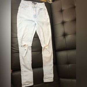 Fashion nova high waisted jeans with rips in the knees
